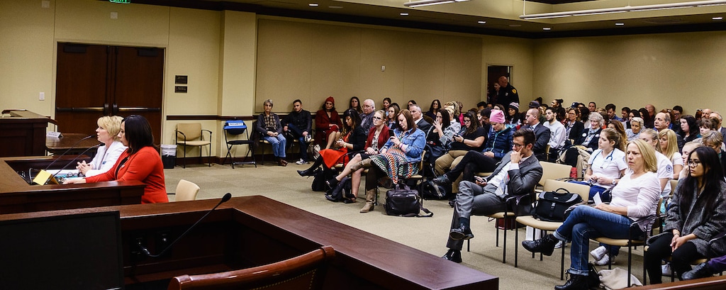 Trent Nelson | The Salt Lake Tribune
Julie Valentine and Rep. Angela Romero, D-Salt Lake City, speak as the House Law Enforcement and Criminal Justice Standing Committee holds a hearing on HB0200, legislation requiring testing of all rape kits, in Salt Lake City, Friday February 3, 2017.