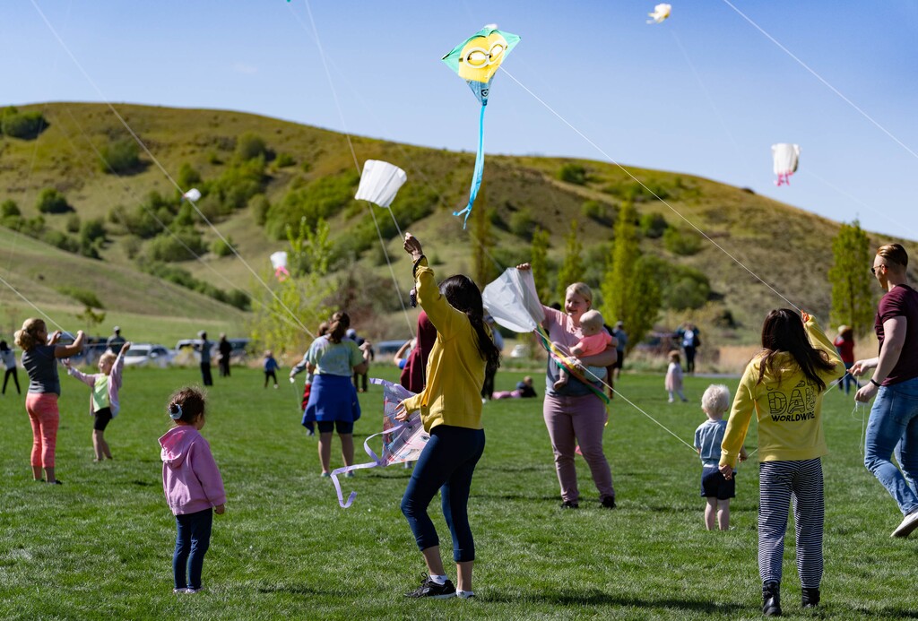 (Francisco Kjolseth | The Salt Lake Tribune) Families fly kites as the City of North Salt Lake celebrates their 75th anniversary at Tunnel Springs Park with a kite festival on Saturday, May 8, 2021. Utah’s brief bout of spring-like weather is going to end on Friday night, according to the National Weather Service.