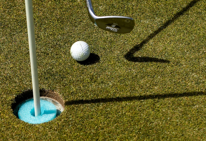 (Leah Hogsten | The Salt Lake Tribune) Online tee time reservations and foam bumpers in the cups at Rose Park Golf Course ensures golfers are mindful of hygiene on the links, April 9, 2020.