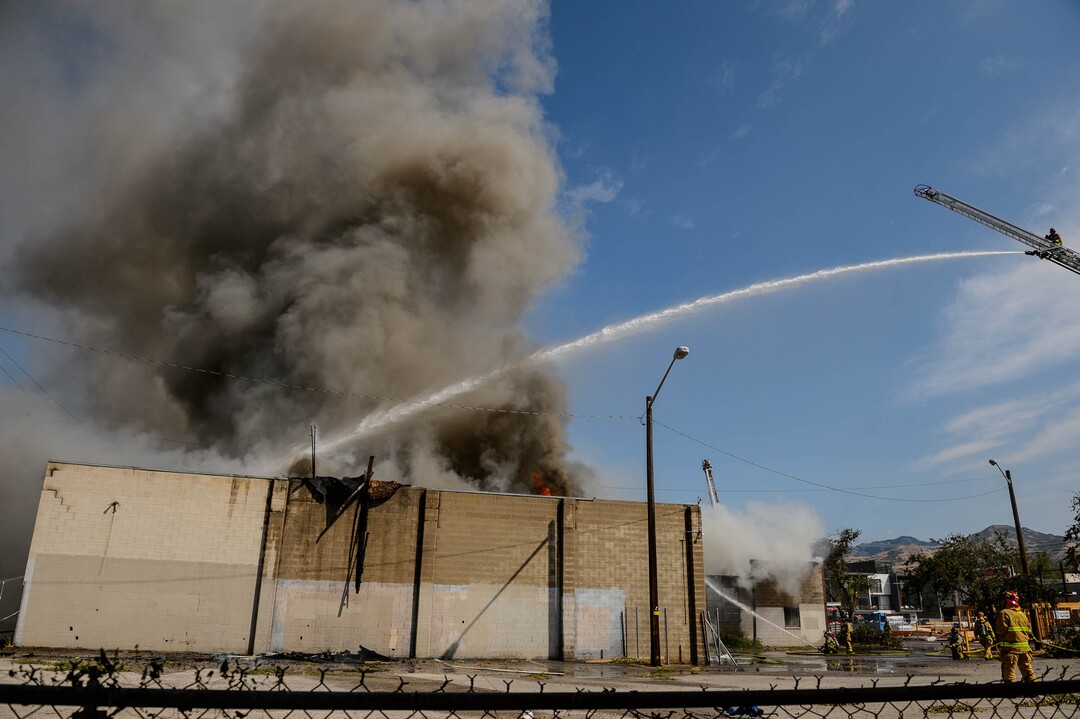 (Trent Nelson  |  The Salt Lake Tribune) Crews work to extinguish a fire at 800 South 200 West in Salt Lake City on Wednesday, Sept. 9, 2020.