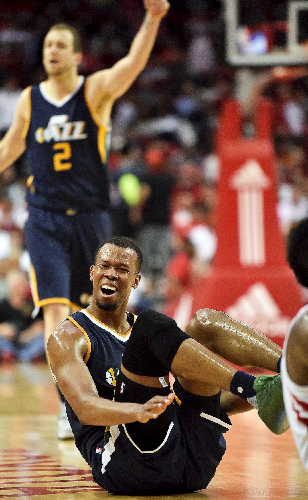 Utah Jazz guard Rodney Hood, bottom, reacts after being called for a foul in the second half of an NBA basketball game against the Houston Rockets, Wednesday, March 8, 2017, in Houston. Utah won 115-108. (AP Photo/Eric Christian Smith)