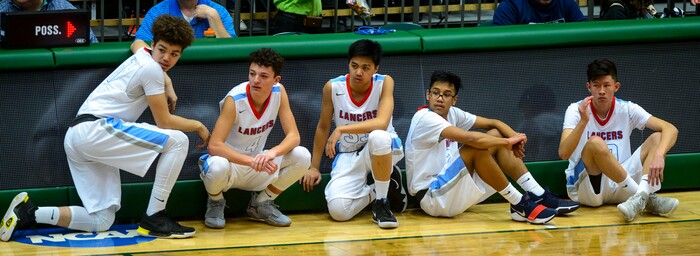(Steve Griffin  |  The Salt Lake Tribune) The Granger reserves get ready to enter the game in the final minutes of their 6A basketball playoff game against Davis at the Utah Valley UniversityÕs UCCU Center in Provo Tuesday Feb. 27, 2018.
