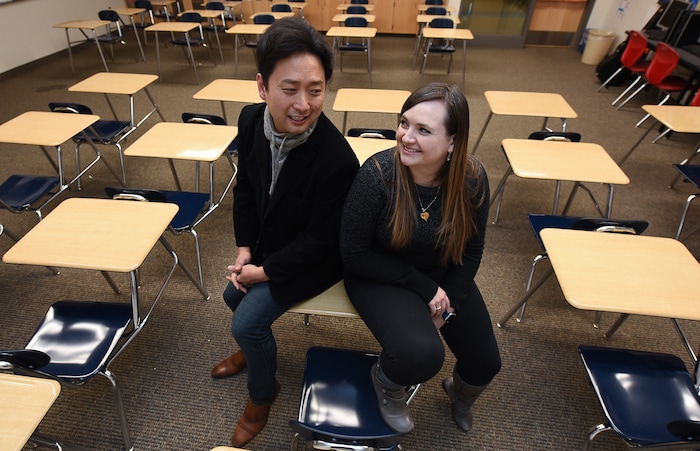 (Francisco Kjolseth  |  The Salt Lake Tribune)  Masa Fukuda, a songwriter, music arranger and director of the One Voice Children's Choir joins his wife Alyssa Fukuda in her classroom at Granger High School where she teaches Japanese. Set up by a friend in July of 2015, the two married a few months later in October. 