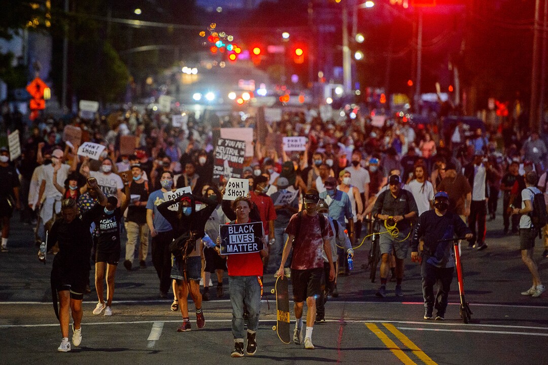 (Trent Nelson  |  The Salt Lake Tribune) Protesters march through Salt Lake City on Monday, June 1, 2020.