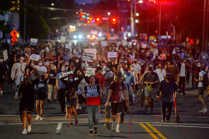(Trent Nelson  |  The Salt Lake Tribune) Protesters march through Salt Lake City on Monday, June 1, 2020.