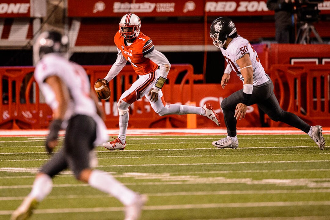 (Trent Nelson | The Salt Lake Tribune)  Utah Utes quarterback Tyler Huntley (1) scrambles as the University of Utah hosts Washington State, NCAA football in Salt Lake City, Saturday November 11, 2017.