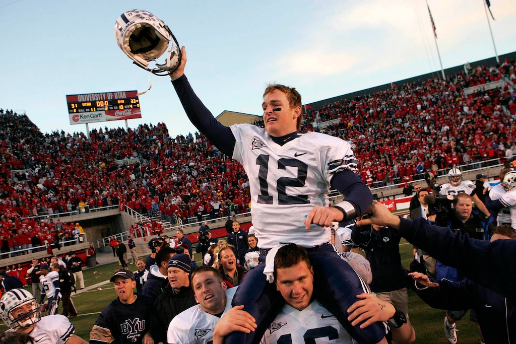 (Trent Nelson | The Salt Lake Tribune) BYU quarterback John Beck is carried off the field after a comeback win versus Utah in 2006. Beck was hired this week by the New York Jets as an assistant, hoping to help former BYU star Zach Wilson navigate the NFL.
