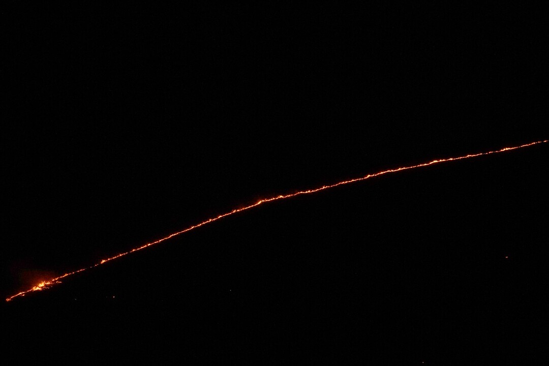 (George Frey  |  for The Salt Lake Tribune) A wildfire burns on Traverse Mountain above Lehi, Uta,h on June 28th, 2020.
