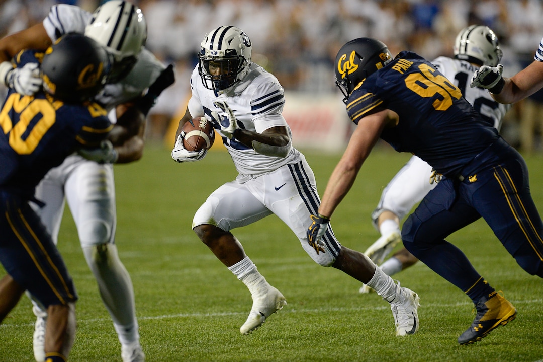 (Francisco Kjolseth  |  The Salt Lake Tribune)  Brigham Young Cougars running back Squally Canada (22) carries the ball against California during the second half of the NCAA college football game, Saturday, Sept. 8, 2018, at LaVell Edwards stadium in Provo, Utah.