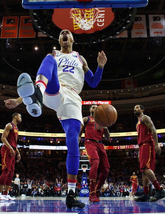 Philadelphia 76ers' Richaun Holmes reacts after dunking during the first half of an NBA basketball game against the Cleveland Cavaliers, Friday, April 6, 2018, in Philadelphia. (AP Photo/Chris Szagola)