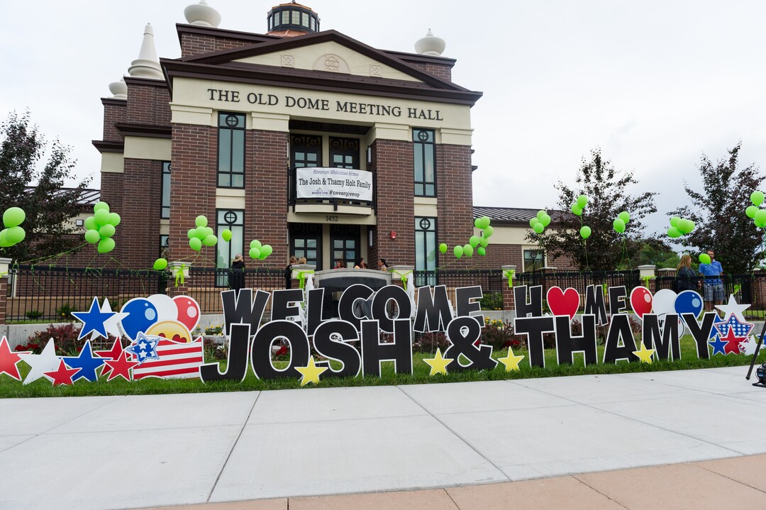 Alex Gallivan  |  Special to the Tribune Hundreds of people tuned out in Riverton to celebrate the arrival of Josh Holt, his wife, Thamy, and their daughter, Marian, Monday, May 28,2018