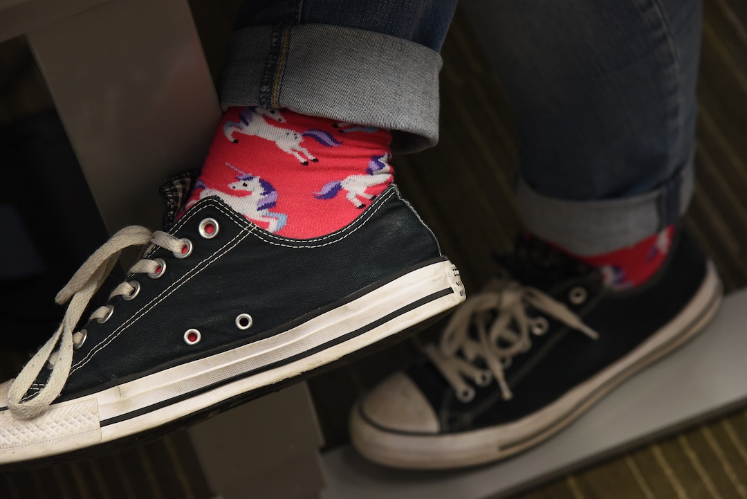 (Francisco Kjolseth  |  The Salt Lake Tribune)  Sophie Nicholson, of Ogden expresses a little of her personality through her unicorn socks as she attends EncircleÕs 2nd annual LGBTQ+ youth summit at Adobe headquarters in Lehi on Saturday, Dec. 1, 2018.
