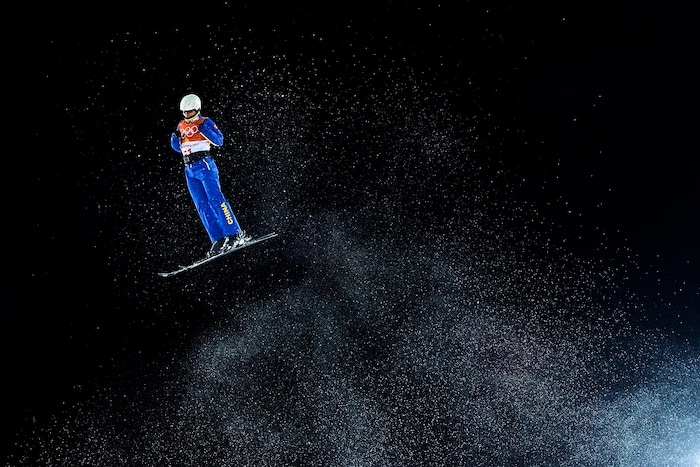 (Chris Detrick  |  The Salt Lake Tribune)   A forerunner jumps before the Ladies' Aerials Qualification at Phoenix Park during the Pyeongchang 2018 Winter Olympics Thursday, Feb. 15, 2018. 