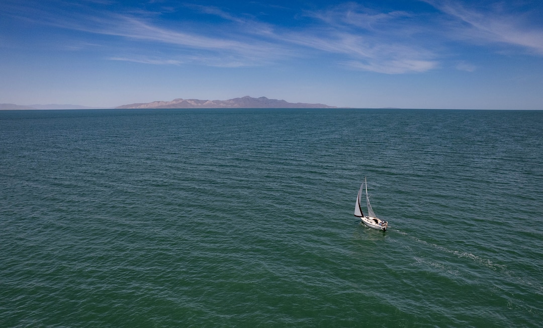 (Francisco Kjolseth  |  The Salt Lake Tribune) A sailboat catches the wind on the Great Salt Lake as Sailfest returns for the first time in fiver years on Saturday, June 15, 2024. The event was canceled in previous years because of low lake levels and the pandemic. 