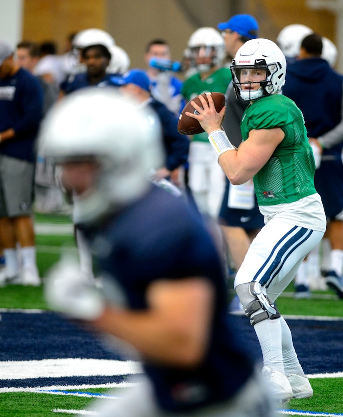 (Steve Griffin  |  The Salt Lake Tribune)  BYU quarterback Beau Hoge runs a play during spring football practice at the indoor practice facility in Provo Thursday March 15, 2018.