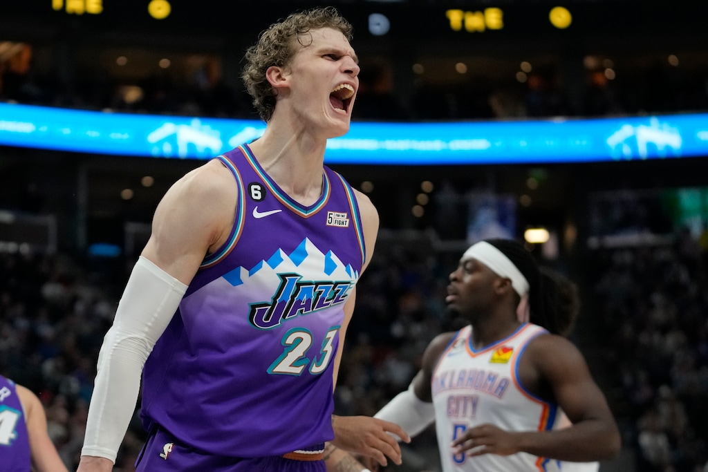 Utah Jazz forward Lauri Markkanen (23) reacts after a dunk against the Oklahoma City Thunder during the second half of an NBA basketball game Thursday, Feb. 23, 2023, in Salt Lake City. (AP Photo/Rick Bowmer)