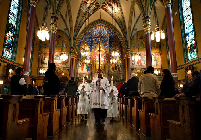 (Scott Sommerdorf   |  The Salt Lake Tribune)   The procession leaves at the end of the early morning Christmas Eve mass on the fourth Sunday of Advent at the Cathedral of the Madeleine, Sunday, December 24, 2017. 