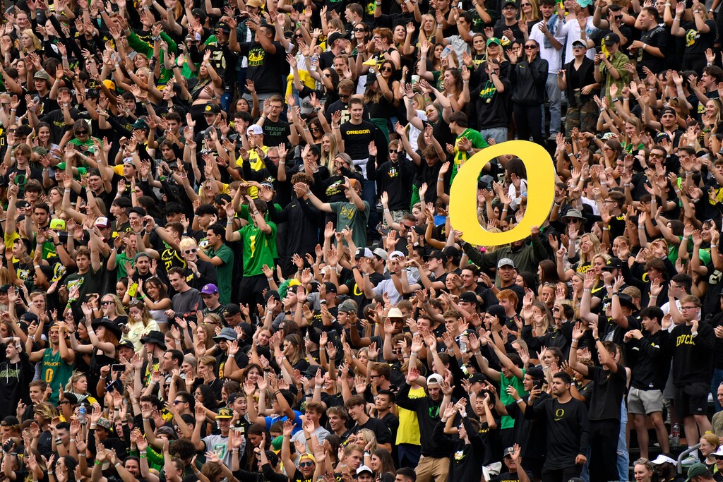 (Andy Nelson |AP) Oregon students and fans cheer the during the first half of an NCAA college football game against BYU Saturday, Sept. 17, 2022, in Eugene, Ore.