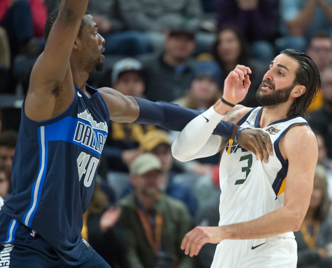 (Rick Egan  |  The Salt Lake Tribune)    Utah Jazz guard Ricky Rubio (3) battles for position with Dallas Mavericks forward Harrison Barnes (40), in NBA action between Utah Jazz and Dallas Mavericks in Salt Lake City, Saturday, Feb. 24, 2018.