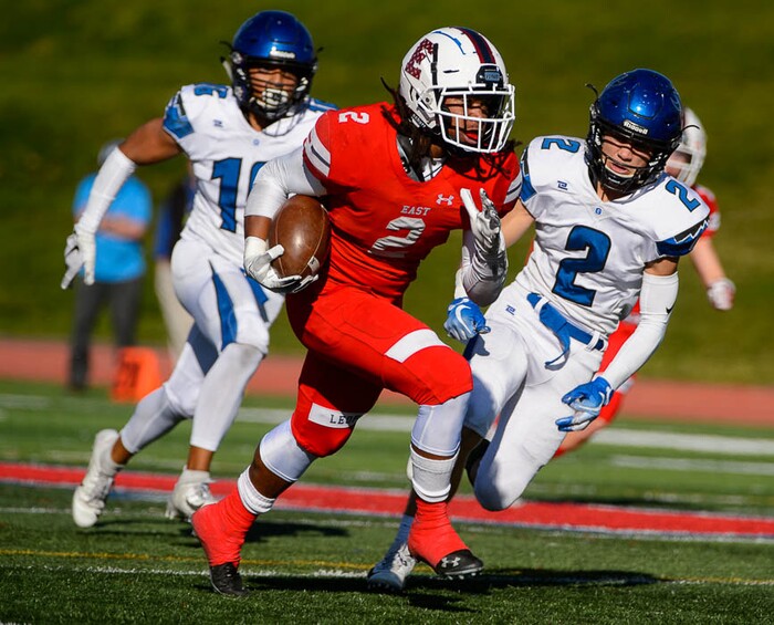 (Trent Nelson | The Salt Lake Tribune)
East's Tutu Spann (2) runs the ball as East hosts Pleasant Grove in the first round of the 6A high school football playoffs, Friday Oct. 26, 2018.