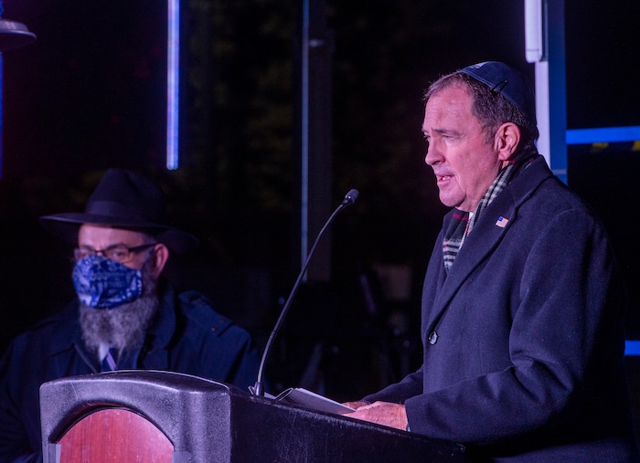 (Rick Egan | The Salt Lake Tribune) Gov. Gary Herbert speaks before the lighting of Utah's tallest menorah at the Utah Capitol for the first night of Hanukkah on Thursday, Dec. 10, 2020.