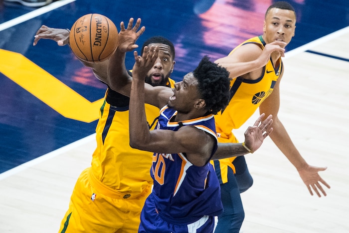 (Chris Detrick  |  The Salt Lake Tribune)  Utah Jazz forward Royce O'Neale (23) guards Phoenix Suns guard Josh Jackson (20) during the game at Vivint Smart Home Arena Thursday, March 15, 2018. 