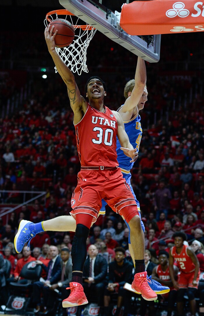(Francisco Kjolseth  |  The Salt Lake Tribune)  Utah Utes guard Gabe Bealer (30) lays one up as the University of Utah hosts UCLA in NCAA basketball at the Huntsman Center in Salt Lake City, Thursday, Feb. 22, 2018.