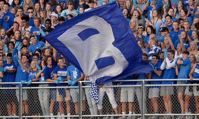 (Francisco Kjolseth  |  The Salt Lake Tribune)  The Bingham High student section cheers on their team as they rack up touchdown after touchdown against East High at East on Friday, Aug. 24, 2018.