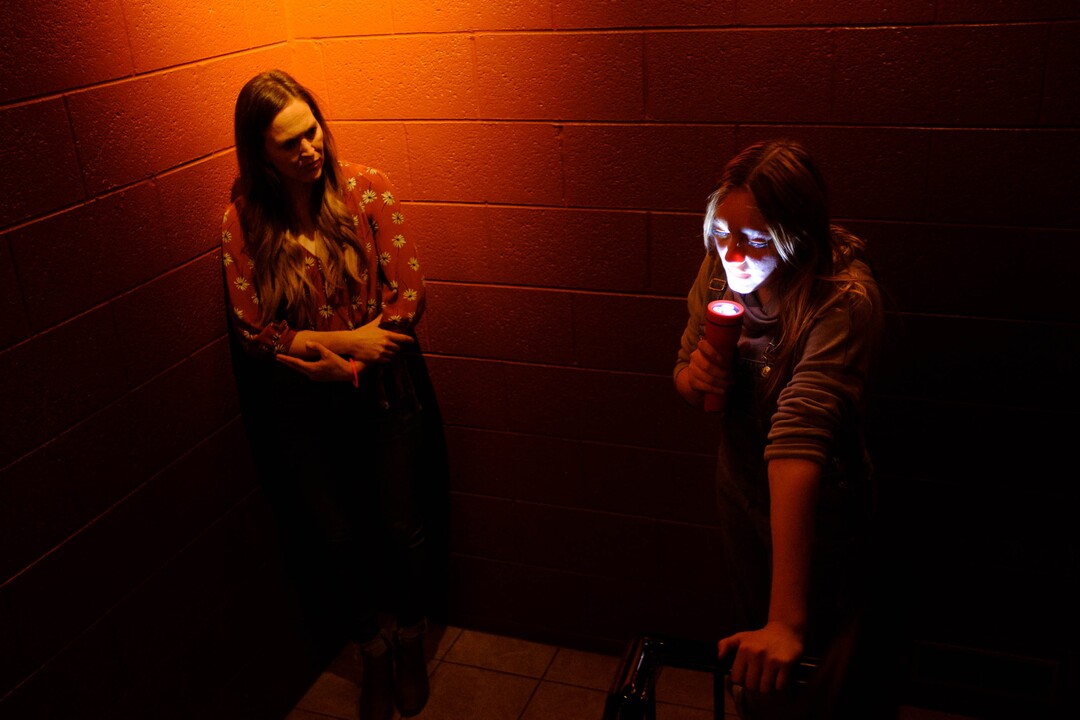 (Trent Nelson  |  The Salt Lake Tribune) Bella Estrada-Brown, right, in "Thank You Theobromine," an interactive production that takes place inside a Salt Lake City chocolate factory on Sunday Nov. 17, 2019. For the 90-minute show — Produced by SONDERImmersive — the audience moves in and out of different rooms learning about the life and creative mind of a chocolatier through dance and theater. (The audience gets chocolate, too.)