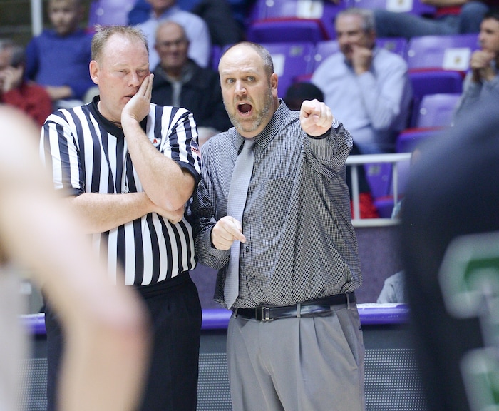 (Leah Hogsten  |  The Salt Lake Tribune) Hillcrest's head coach Sam Richins argues a call. Fremont faces Hillcrest in the 6A High School Boys' Basketball Tournament opening game at Weber State UniversityÕs Dee Events Center in Ogden, Tuesday, Feb. 27, 2018. 