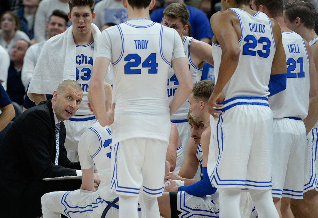 (Francisco Kjolseth  |  The Salt Lake Tribune)  Head coach for BYU Mark Pope talks with his team during a time out as BYU takes on UNLV in men's NCAA basketball at Vivint Smart Home Arena in Salt Lake City on Sat. Dec. 7, 2019. Pope has raised expectations in Provo after his first two hugely successful seasons coaching the Cougars.