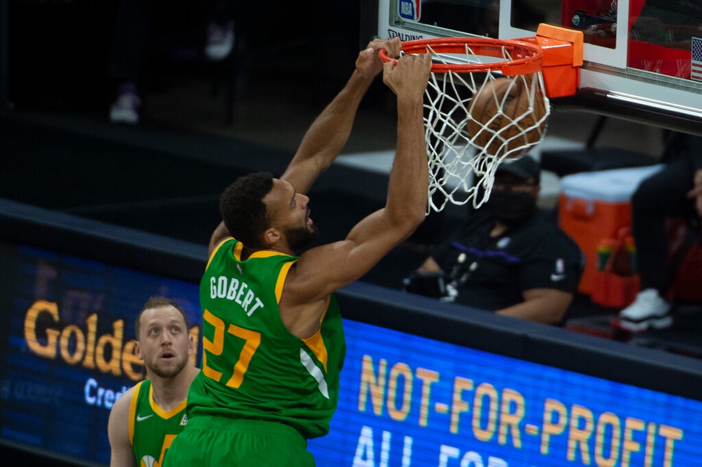Utah Jazz center Rudy Gobert (27) dunks the ball against the Sacramento Kings during the first quarter of an NBA basketball game in Sacramento, Calif., Sunday, May 16, 2021. (AP Photo/Randall Benton)