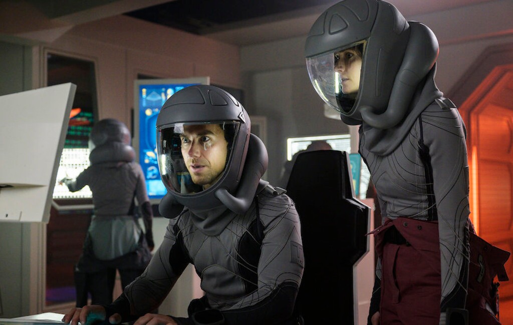(Aleksandar Letic | Ark TV Holdings, Inc./SYFY) Richard Fleeshman as Lt. James Brice and Christie Burke as Lt. Sharon Garnet on "The Ark."