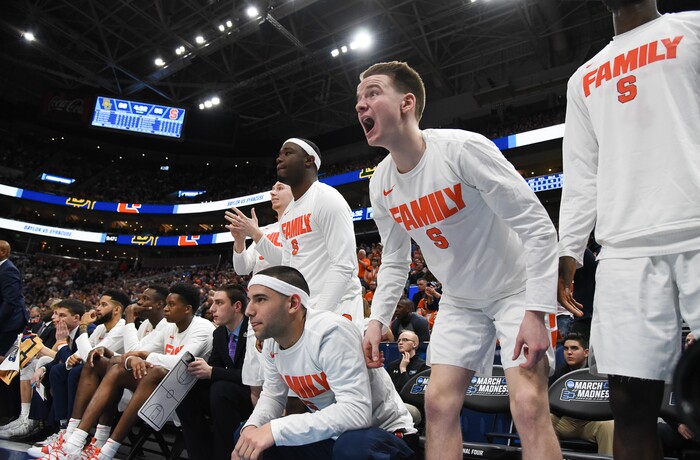 (Francisco Kjolseth  |  The Salt Lake Tribune)  The Syracuse bench cheers on their team as Syracuse faces Baylor in their first round men's NCAA March Madness tournament game at Vivint Smart Home Arena in Salt Lake City on Thursday, March 21, 2019.