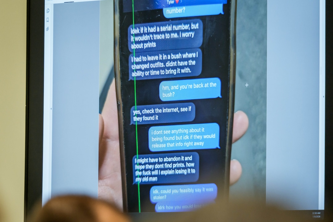 (Spenser Heaps | Pool) A photograph which prosecutors say shows a text message exchange between Tyler Robinson, who is accused in the fatal shooting of Charlie Kirk, and Robinson’s roommate and romantic partner Lance Twiggs, is shown during a preliminary hearing at the Fourth District Courthouse in Provo, Thursday, July 9, 2026.