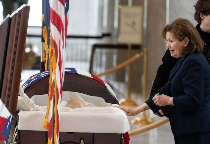 (Francisco Kjolseth | The Salt Lake Tribune) Jacalyn Leavitt, wife of former Utah governor Michael Leavitt, pays her respects during a public viewing of Sen. Orrin Hatch at the Utah Capitol on Wednesday, May 4, 2022. Hatch, the longest-serving Republican senator in U.S. history and the longest-serving from Utah, died April 23 at age 88.