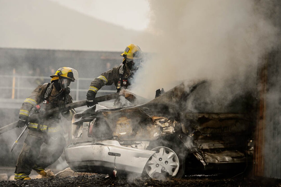 (Trent Nelson  |  The Salt Lake Tribune)  Unified Fire recruits in a live response to a vehicle and structure fire at the Unified Fire Authority Training Center in Magna on Tuesday April 16, 2019.