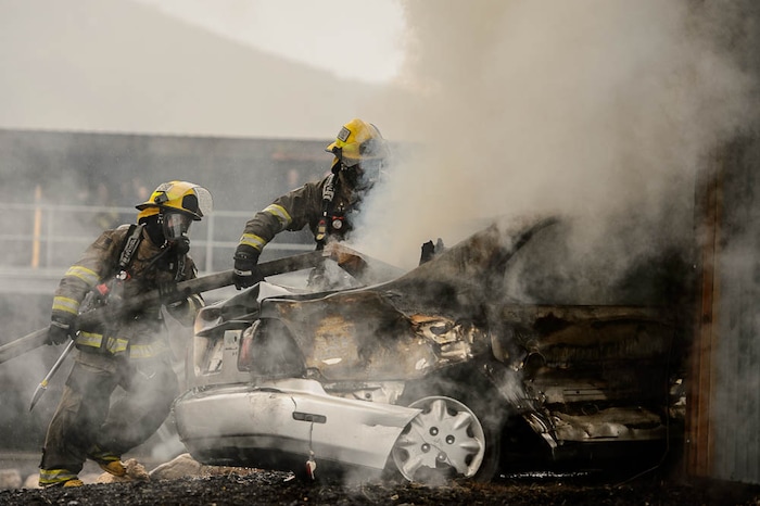 (Trent Nelson  |  The Salt Lake Tribune)  
Unified Fire recruits in a live response to a vehicle and structure fire at the Unified Fire Authority Training Center in Magna on Tuesday April 16, 2019.