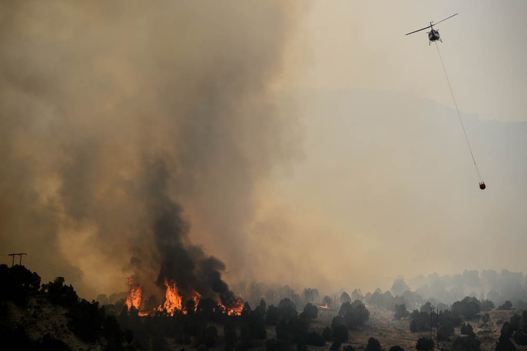 (Trent Nelson | The Salt Lake Tribune) The Coal Hollow Fire burns along Highway 6 in Utah County, Thursday Aug. 9, 2018.