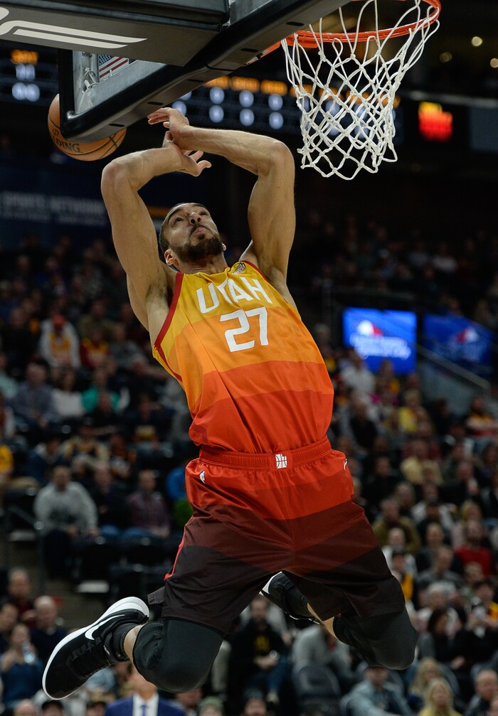(Francisco Kjolseth  |  The Salt Lake Tribune)  Utah Jazz center Rudy Gobert (27) loses his grip on his way to the basket against the pistons in the first half of their NBA game at Vivint Smart Home Arena Monday, Jan. 14, 2019, in Salt Lake City.