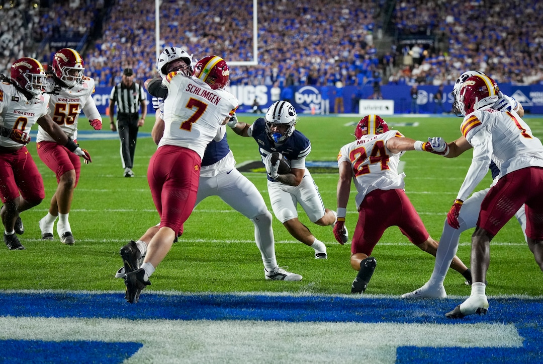 (Bethany Baker  |  The Salt Lake Tribune) BYU Cougars running back Journee Tonga (20) runs the ball in for a touchdown during the game between the BYU Cougars and the Iowa State Cyclones in Provo on Friday, Oct. 9, 2026.