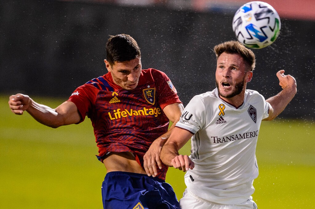 (Trent Nelson  |  The Salt Lake Tribune) Real Salt Lake midfielder Damir Kreilach (8) heads the ball, defended by Colorado Rapids defender Keegan Rosenberry (2) as Real Salt Lake hosts the Colorado Rapids at Rio Tinto Stadium in Sandy on Saturday, Sept. 12, 2020.
