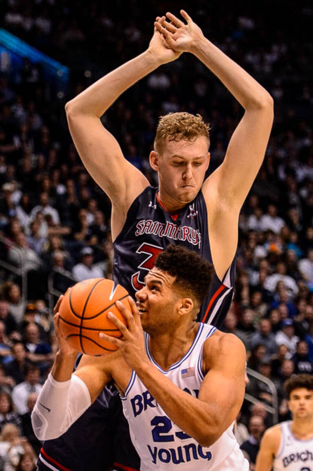 (Trent Nelson | The Salt Lake Tribune)   Brigham Young Cougars forward Yoeli Childs (23) defended by St. Mary's Gaels center Jock Landale (34) as BYU hosts the St. Mary's Gaels, NCAA basketball in Provo, Saturday December 30, 2017.