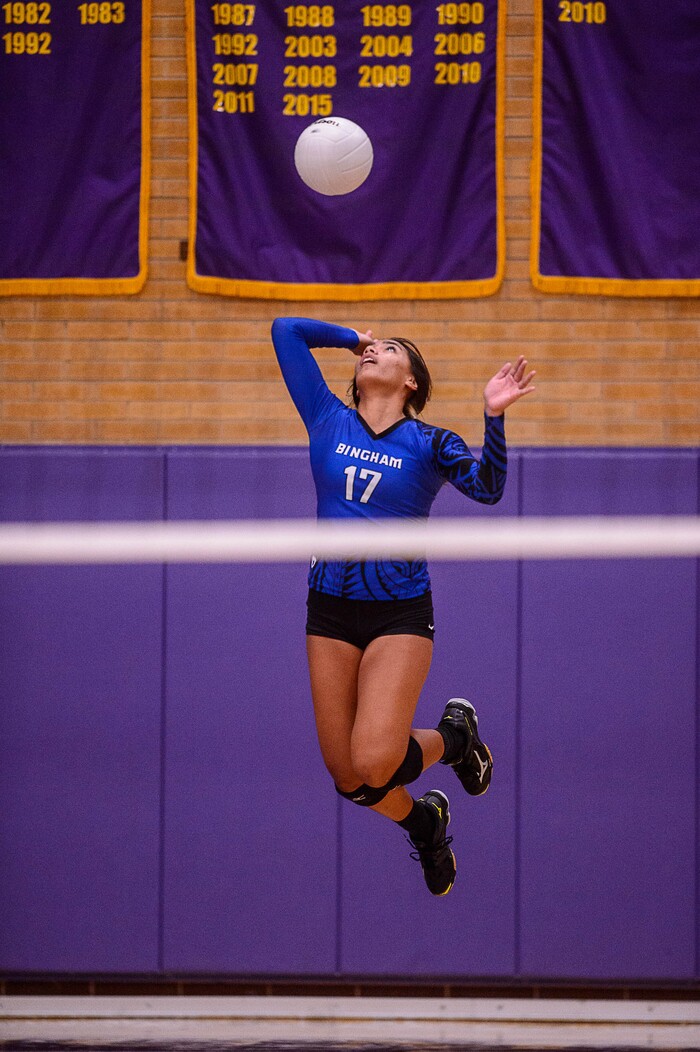 (Trent Nelson  |  The Salt Lake Tribune)  Bingham's Sana Foliaki (17)  serves as North Summit hosts Bingham, high school girls' volleyball in Coalville, Thursday August 17, 2017.