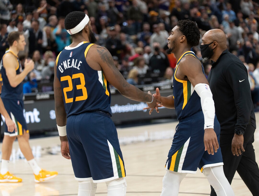 (Rick Egan | The Salt Lake Tribune) Utah Jazz forward Royce O'Neale (23) shakes Donovan Mitchell's (45) hand as he leaves the court after being ejected from the game,  after being involved in the scuffle between Indiana center Miles Turner and  Jazz center Rudy Gobert, resulting in 4 ejections, in the 4th quarter, in NBA action between Utah Jazz and Indiana Pacers at Vivint Arena, on Thursday, Nov. 11, 2021.