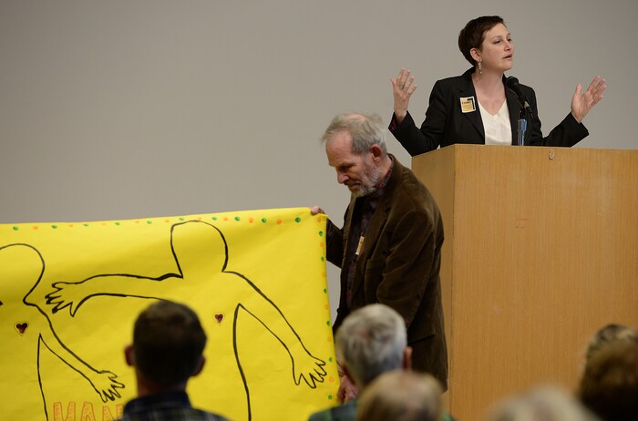 (Scott Sommerdorf   |  The Salt Lake Tribune)  
Behind a banner that says "Our Hearts Are in Your Hands" Rabbi Ilana Schwartzman from Congregation Kol Ami, speaks at the "Faith & Poverty Day at the Utah Capitol, Thursday, January 25, 2018.