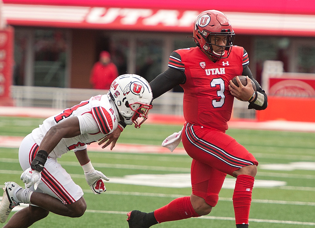 (Ed Kosmicki | Special to The Tribune) Utah's Ja’Quinden Jackson (3) eludes a white team defender at the Utes football spring game at Rice-Eccles Stadium, Saturday, April 23, 2022.