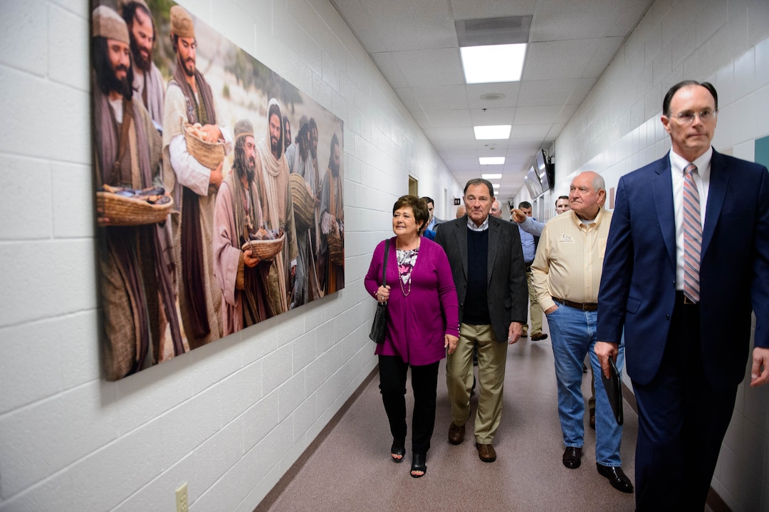 (Trent Nelson  |  The Salt Lake Tribune)  Agriculture Secretary Sonny Perdue on a tour of Welfare Square in Salt Lake City on Wednesday May 22, 2019. From left, Jeanette Herbert, Gov. Gary Herbert, Perdue, and Bishop W. Christopher Waddell.