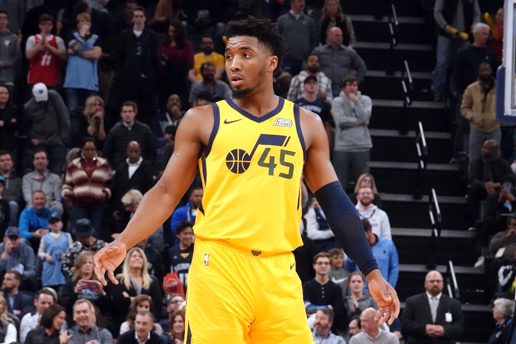 Utah Jazz Donovan Mitchell (45) listens for a call in the second half of an NBA basketball game against the Memphis Grizzlies Friday, Nov. 15, 2019, in Memphis, Tenn. (AP Photo/Karen Pulfer Focht)