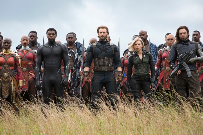 This image released by Marvel Studios shows, front row from left, Danai Gurira, Chadwick Boseman, Chris Evans, Scarlet Johansson and Sebastian Stan in a scene from "Avengers: Infinity War," premiering on April 27. (Chuck Zlotnick/Marvel Studios via AP)